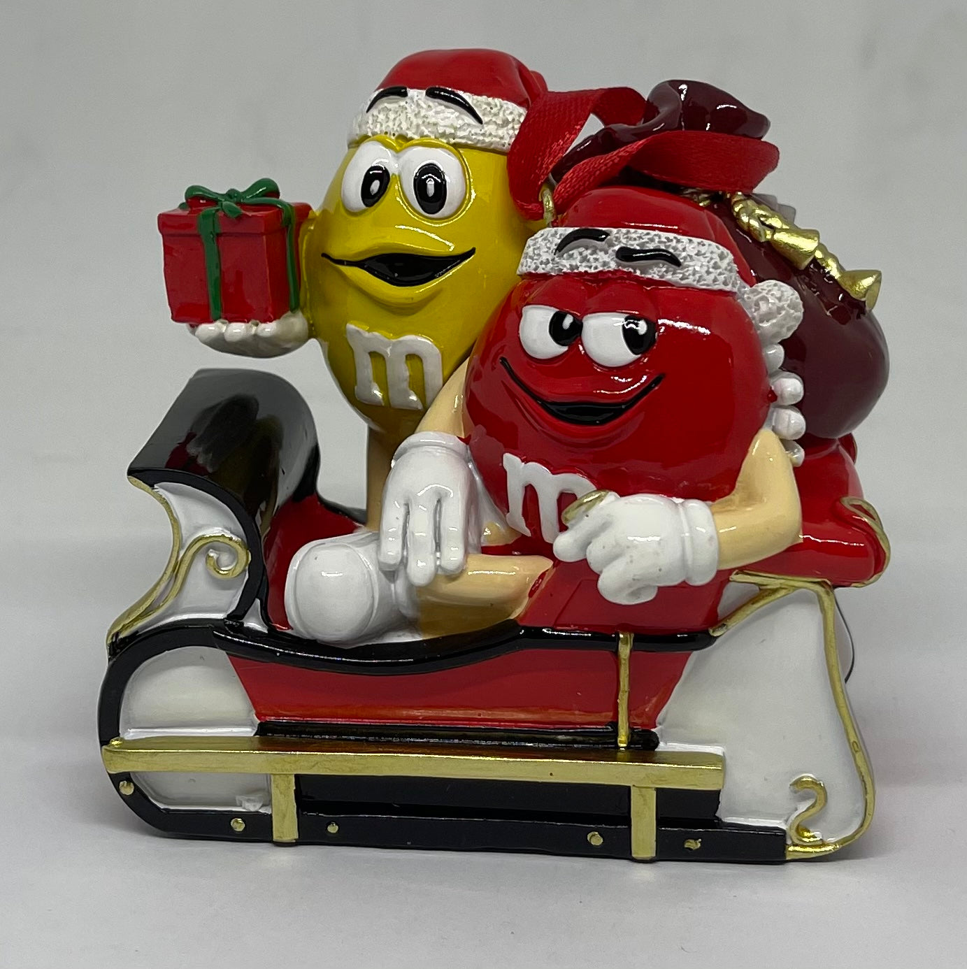 M&M's World Red and Yellow Sleigh Resin Christmas Ornament New with Tag