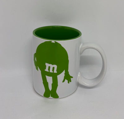 M&M's World Green Silhouette I Simply Do As I Please Darling Coffee Mug New